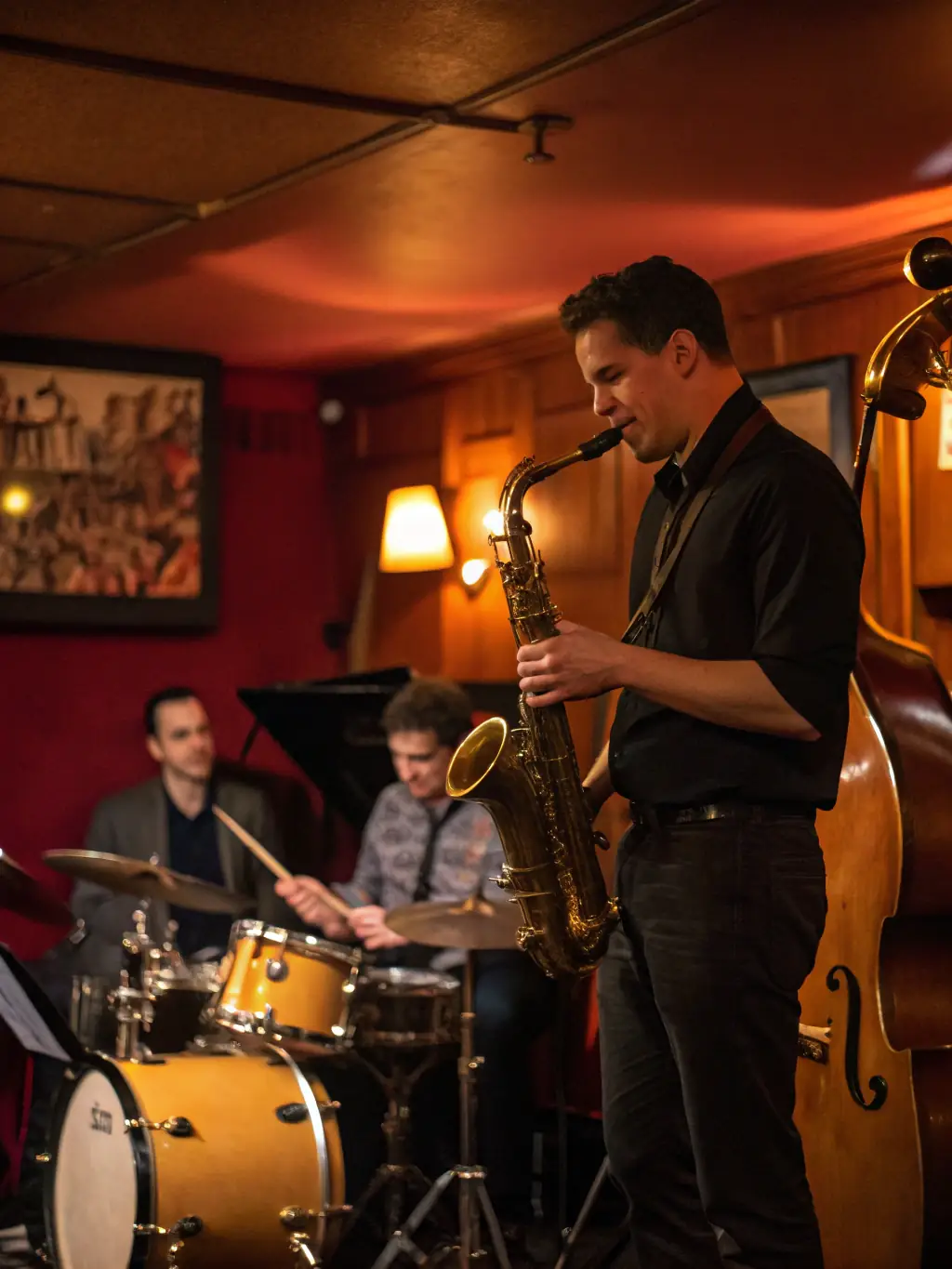 A photograph of a jazz quartet performing live on stage at a bistro in Dijon, France, with warm lighting and a close-up of the musicians.